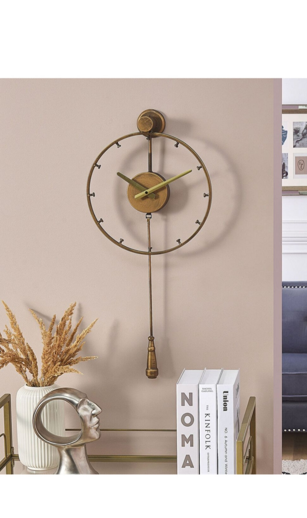 Reloj de pared dorado