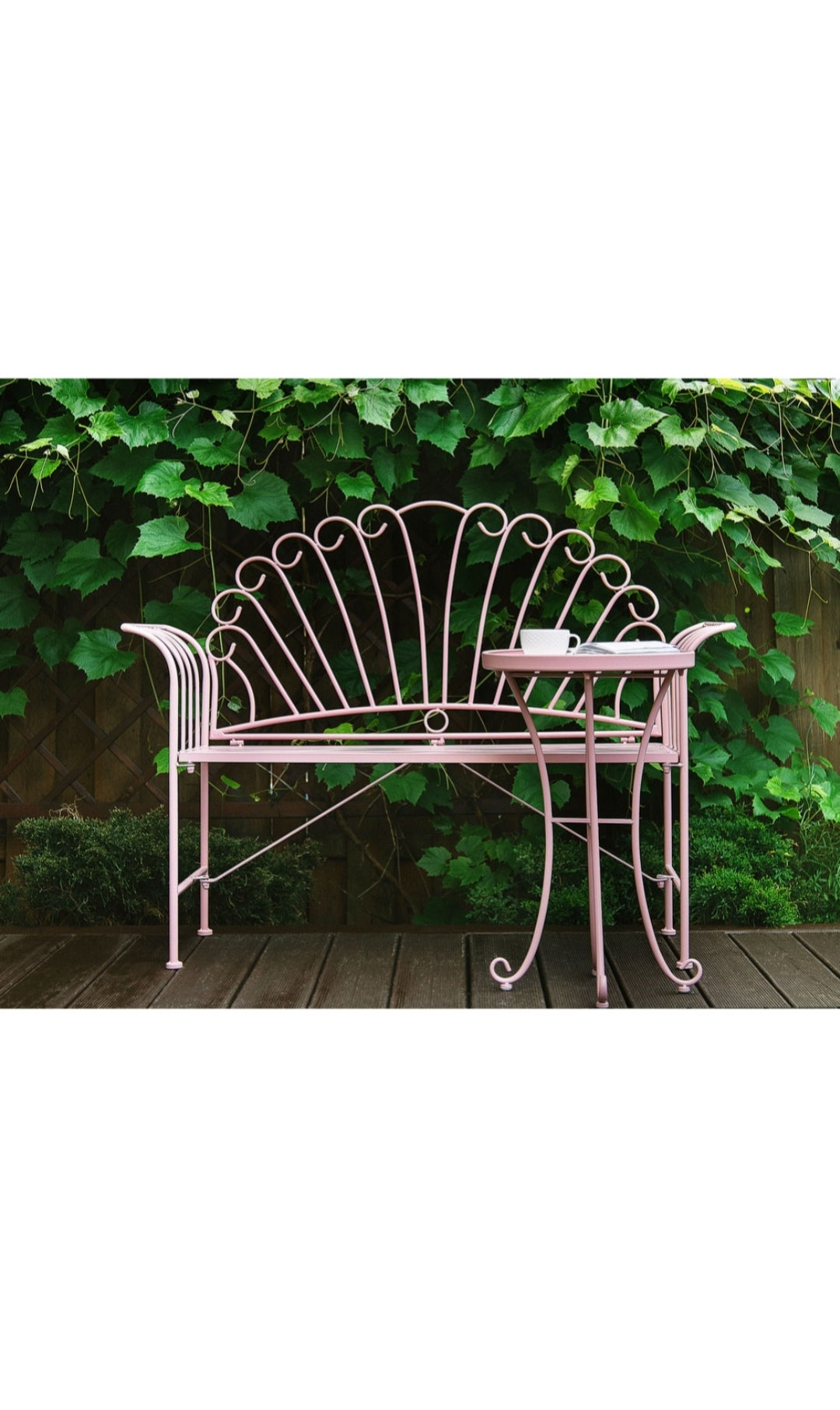 Banco de jardín de metal rosa