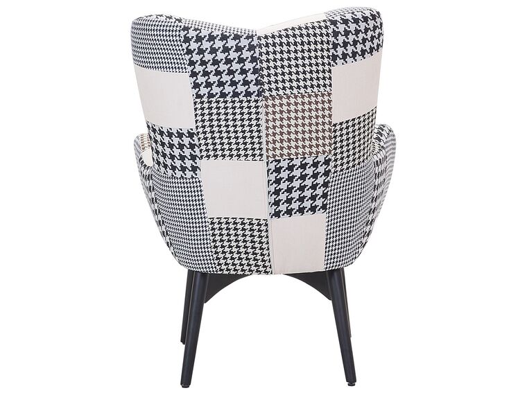 Sillón tapizado con reposapiés