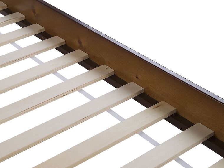Cama con somier de madera de pino oscura