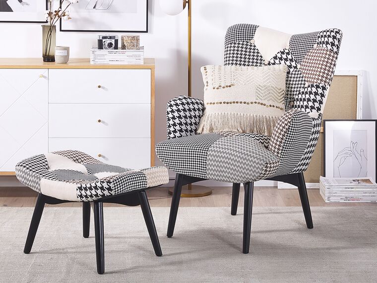 Sillón tapizado con reposapiés