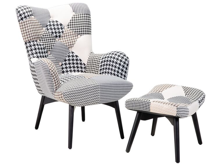 Sillón tapizado con reposapiés