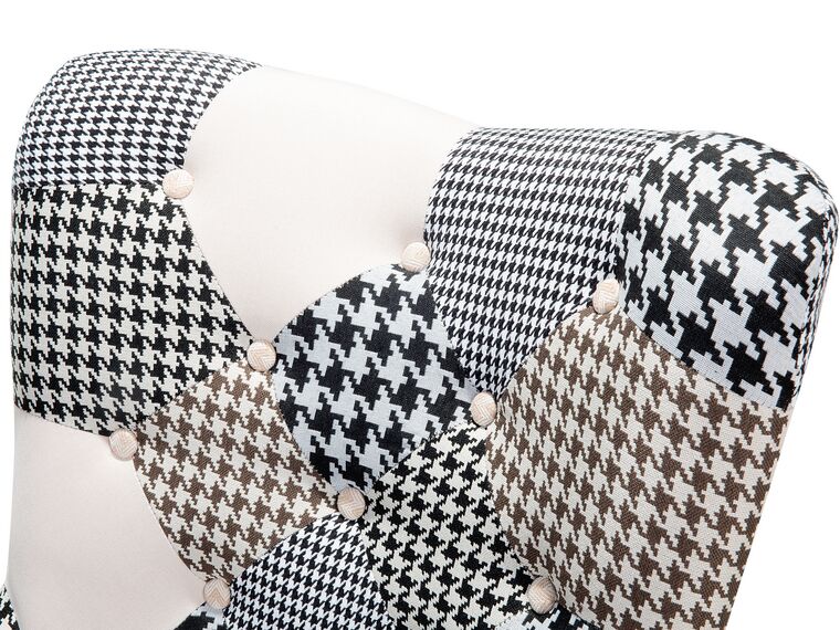 Sillón tapizado con reposapiés